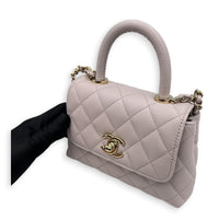 Coco Handle Quilted Super Mini Lilac Top Handle Bag in Caviar Leather, Gold hardware