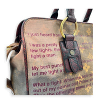 x Richard Prince Graduate Jokes Brown Top Handle Bag in Monogram Coated Canvas, Antique Brass hardware