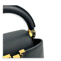 Capucines Mini Black Top Handle Bag in Taurillon Leather, Gold hardware