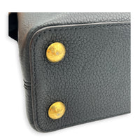 Capucines BB Black Top Handle Bag in Taurillon Leather, Gold hardware