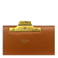 Triomphe Crossbody Bag Medium Tan in Coated Canvas, Gold hardware