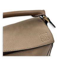 Puzzle Small Beige Top Handle Bag in Calfskin, Gold hardware