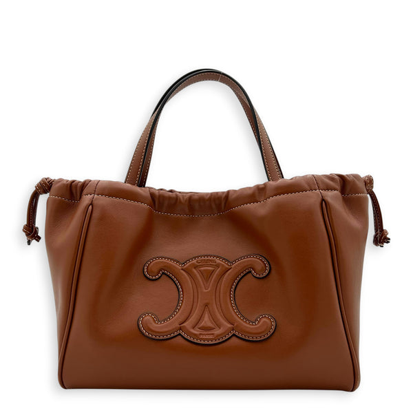 Triomphe Drawstring Top Handle Bag Brown in Calfskin, Gold hardware
