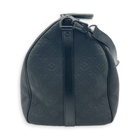 Keepall Bandouliere 50 Black Top Handle Bag in Taurillon Leather, Black hardware