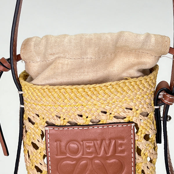 Cylinder Pouch Brown Crossbody Bag in Raffia